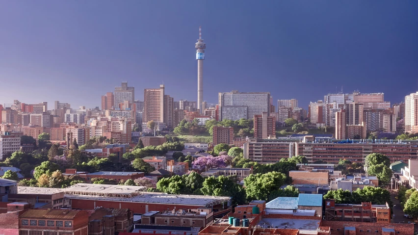 city view in daytime, with a blue sky