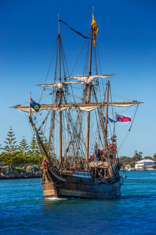 a large pirate ship is sailing in the ocean