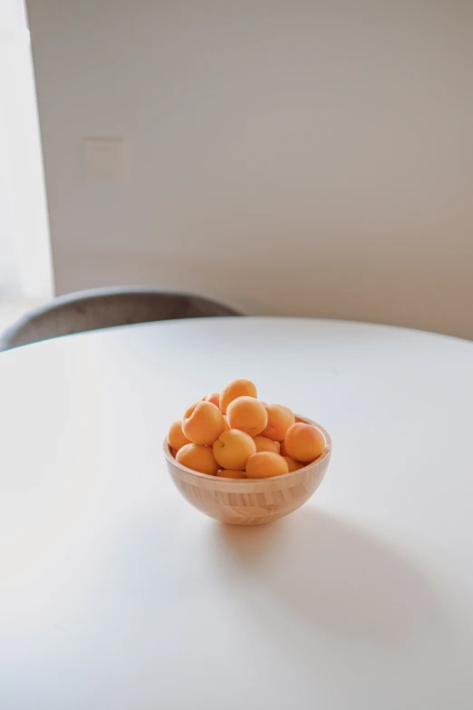 a small bowl of carrots on the table