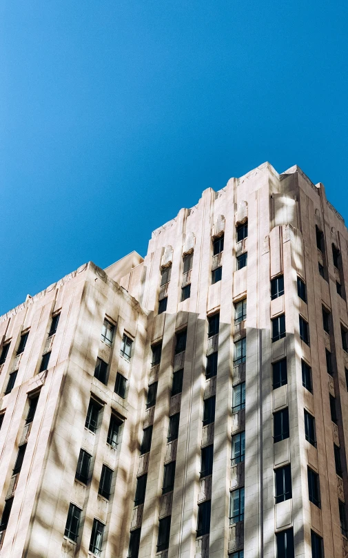 view up at the top of a large apartment building