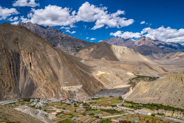 an aerial po of the mountains and village