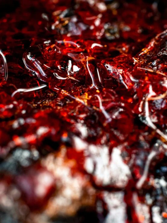 a close up picture of water and red color