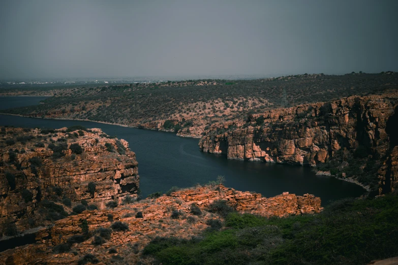 a river and rocks in an arid landscape