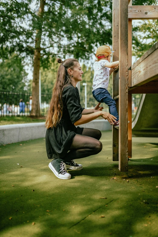 mother with child on playground at park