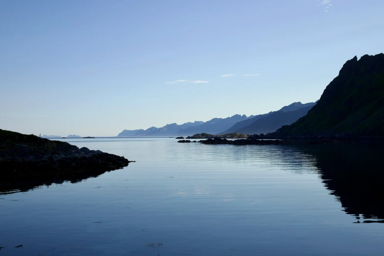 a large body of water surrounded by mountains