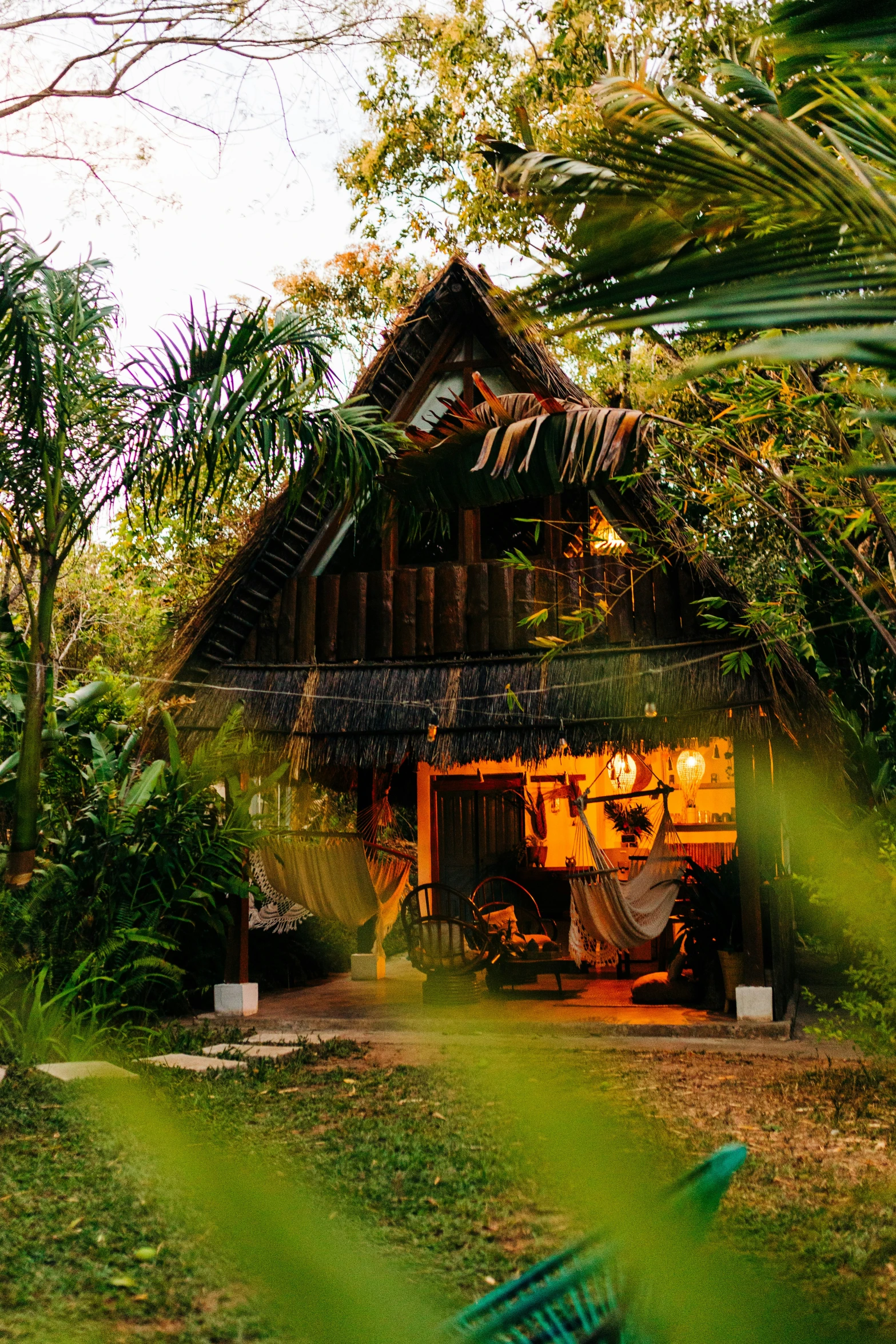 the small hut is set in the trees