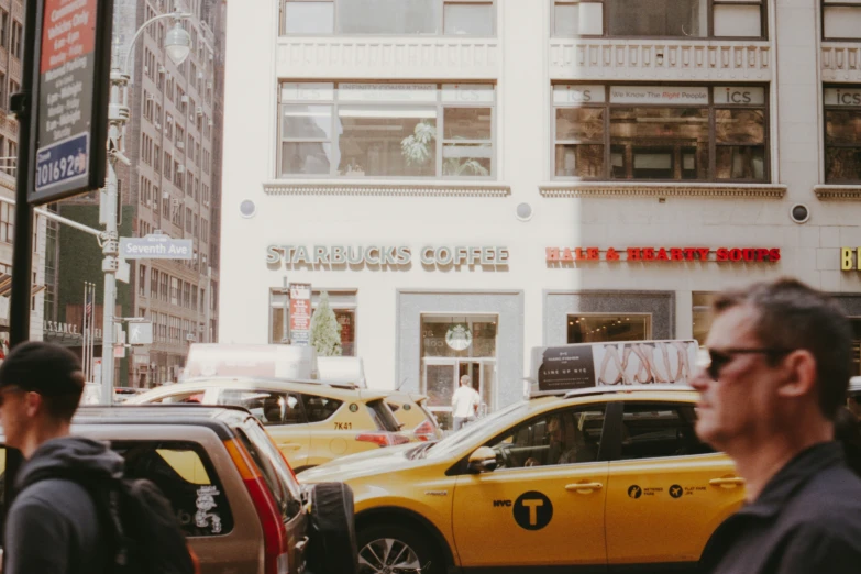 there are many taxis waiting in the street