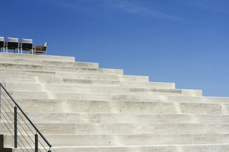 the stairs on top of a set of concrete steps