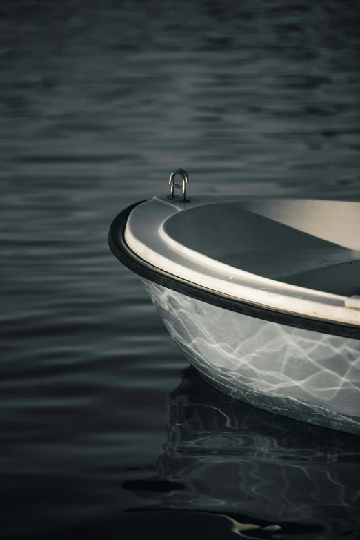 the small motor boat is anchored at low tide