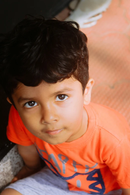 an image of a boy smiling for the camera