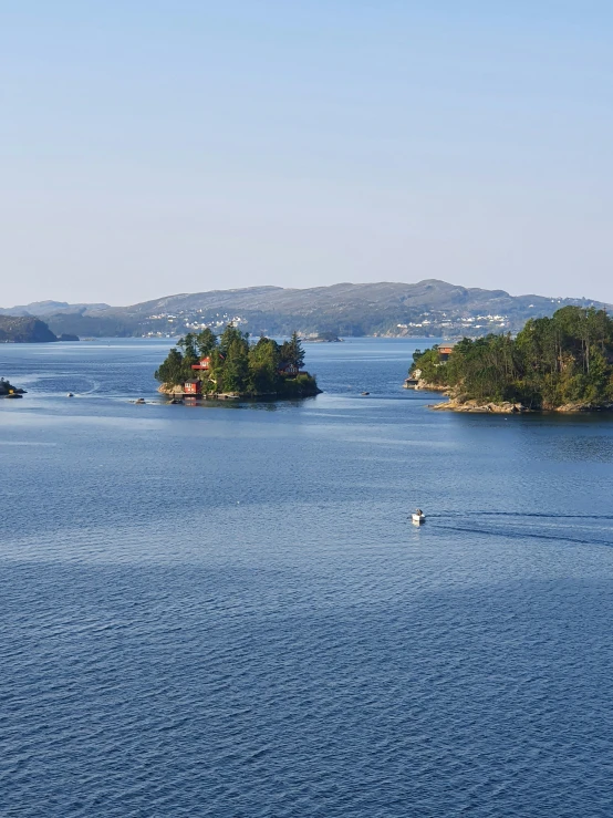 a group of small islands off the coast of a bay