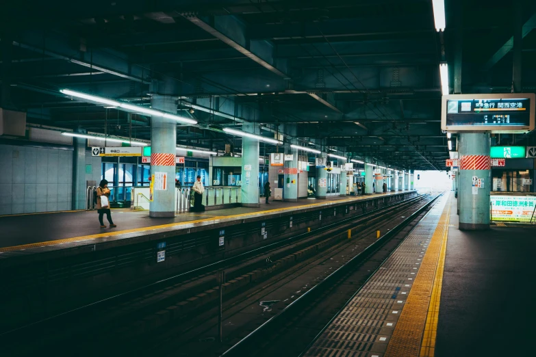 a large long train on a steel track