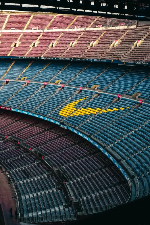 the interior of the stadium's seats is empty