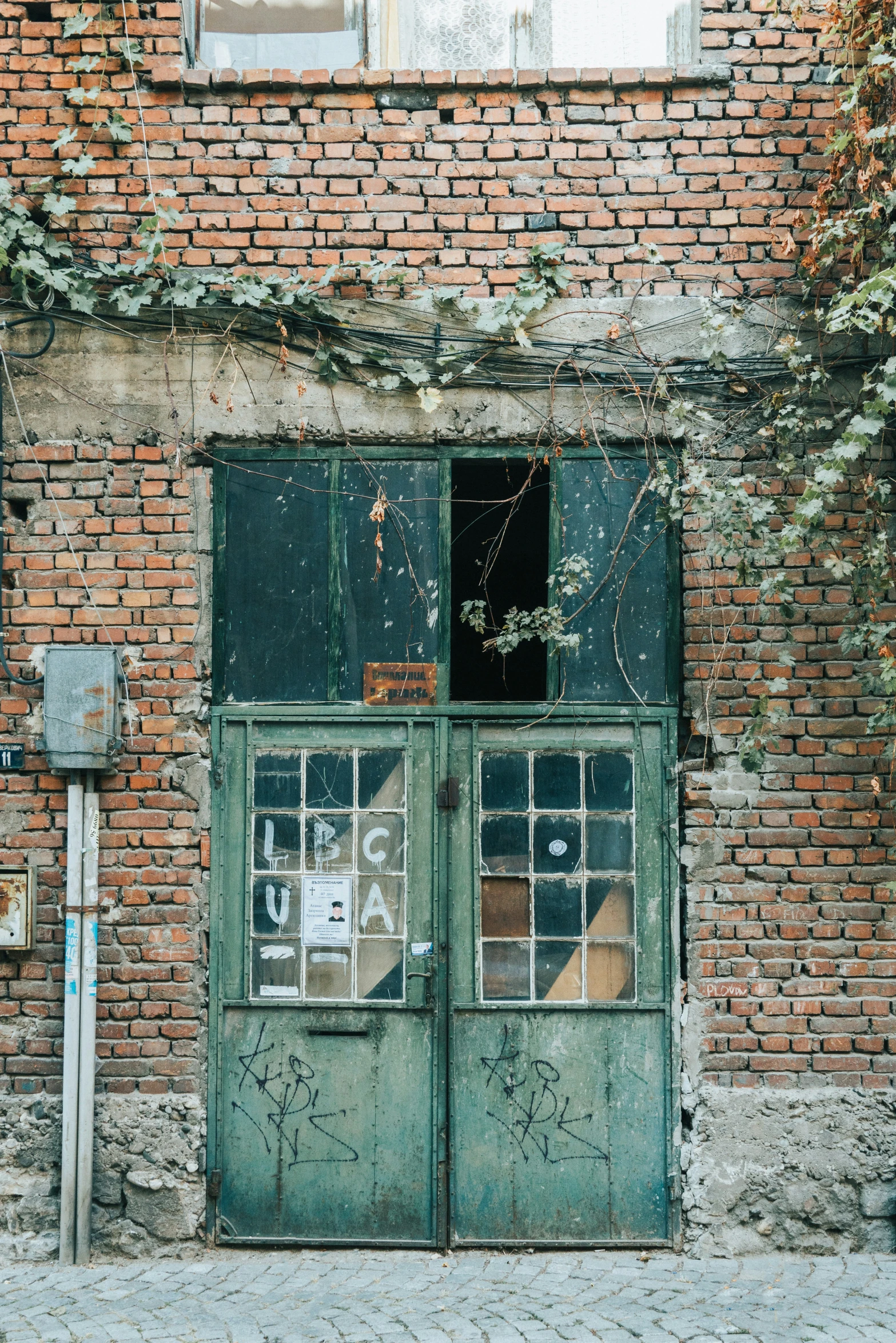 a doorway and some brick on a building