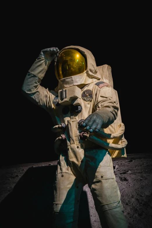 a man in an astronaut suit is standing on the moon