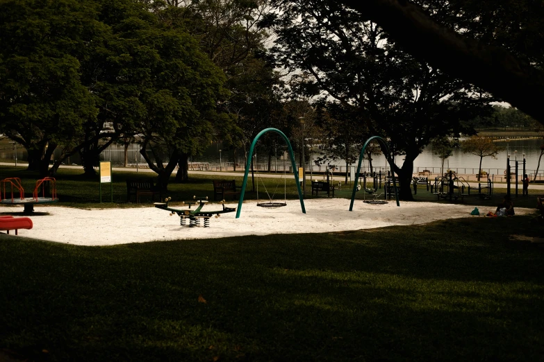 some park toys and swings are on the ground