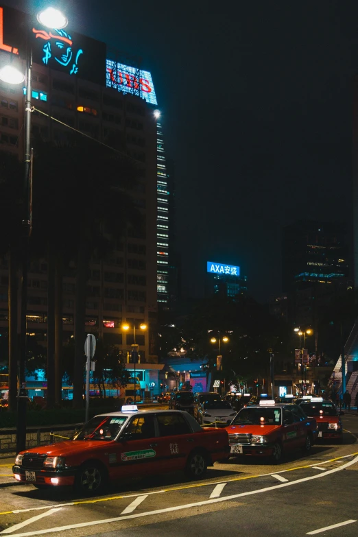 some very nice looking cars at night time