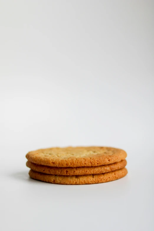 a stack of three large cookies sitting on top of each other