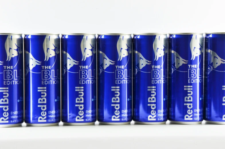 six cans of red bull blue energy drink