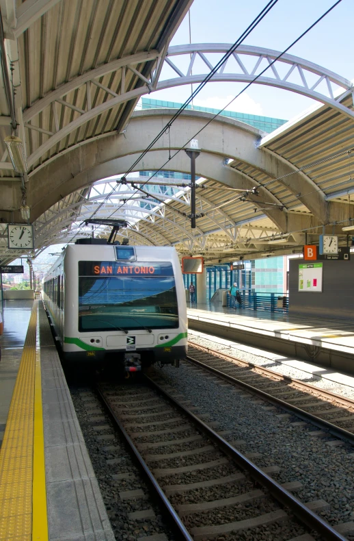 a train sits in the station waiting to pull into