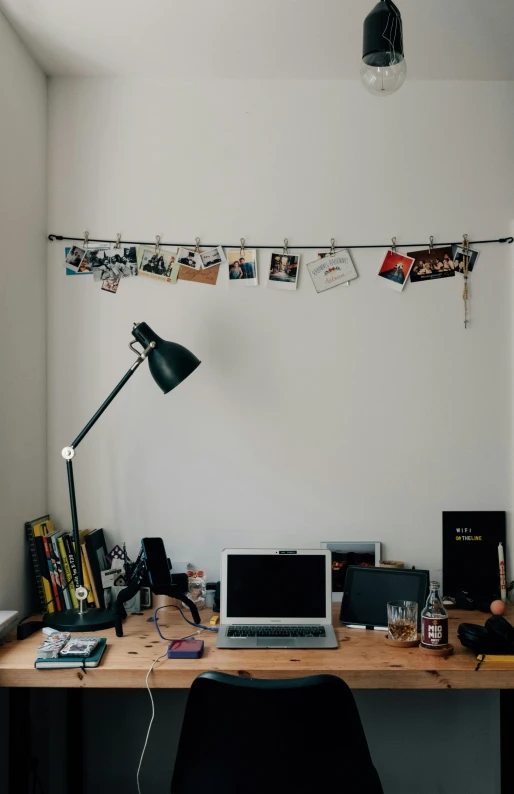 an empty desk has many items on it