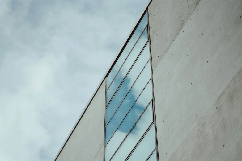 looking up at the corner of a building