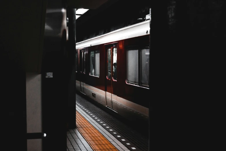 a train in the dark with its lights on