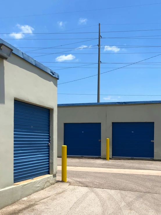 the parking area outside the storage buildings is empty