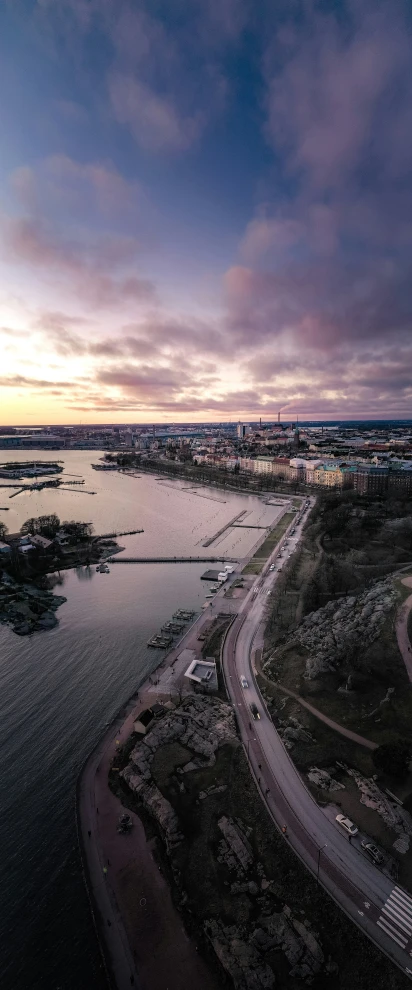 an airplane is flying high over a body of water