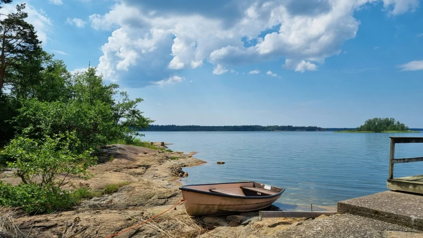 a boat in the water at a dock