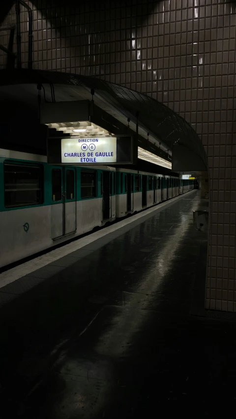 the subway train has stopped for passengers to board