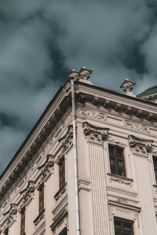 the corner of a building with a steeple