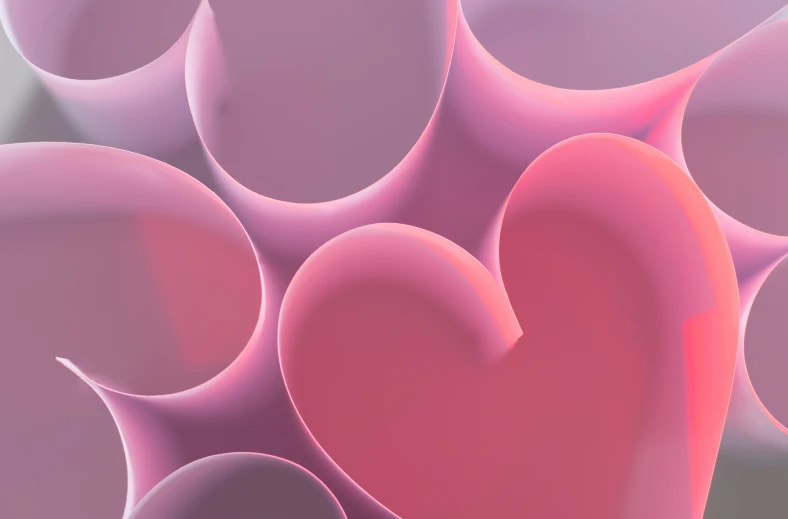 abstractly designed pink paper hearts against a black and gray background