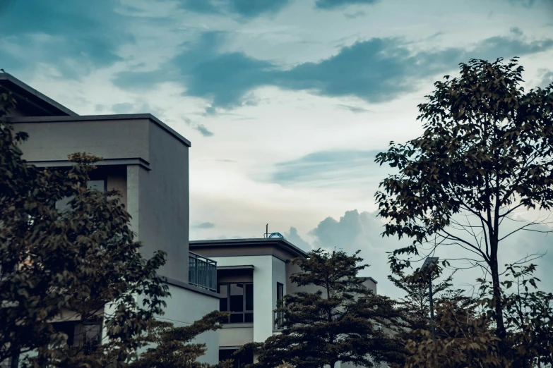 an empty building that is surrounded by trees