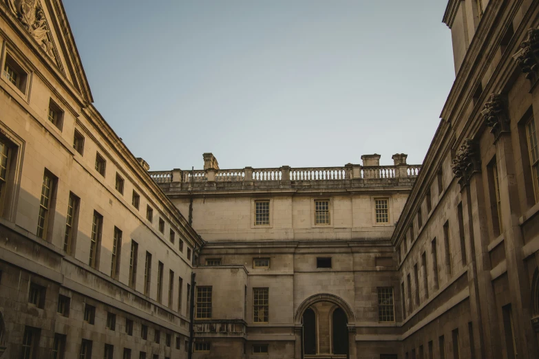 the roof of a building is visible from the courtyard