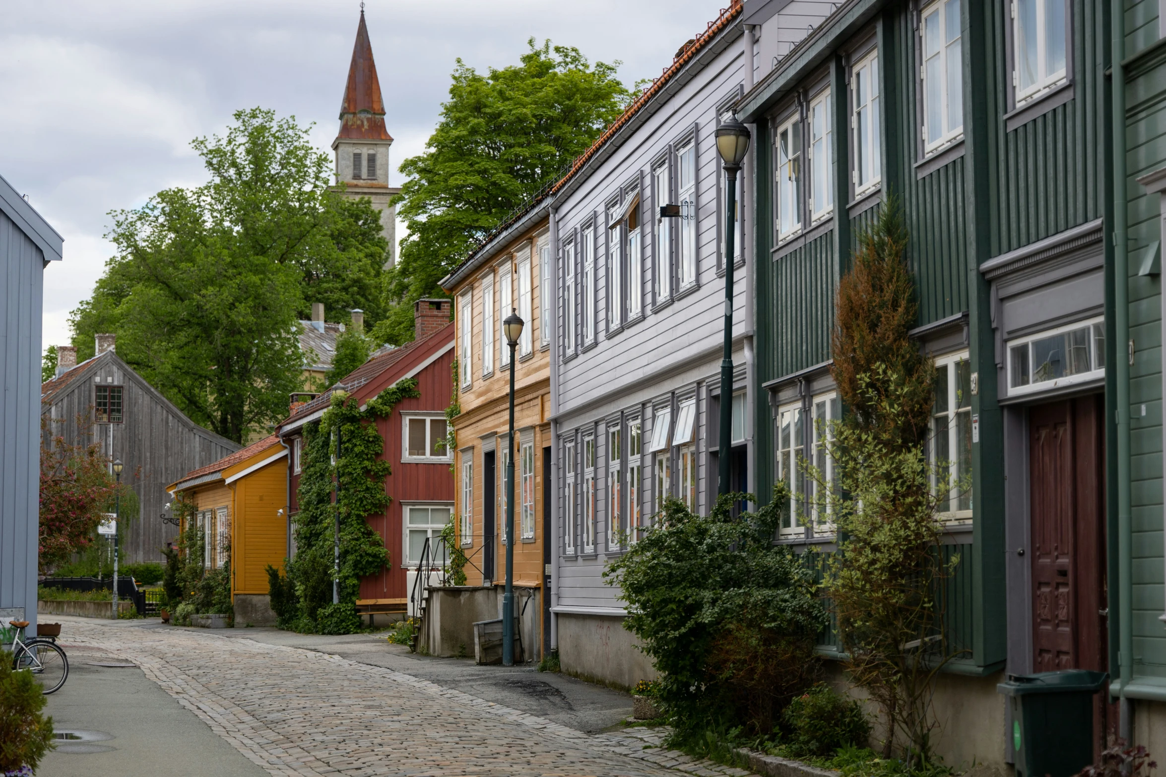 the road has many different colored buildings on it