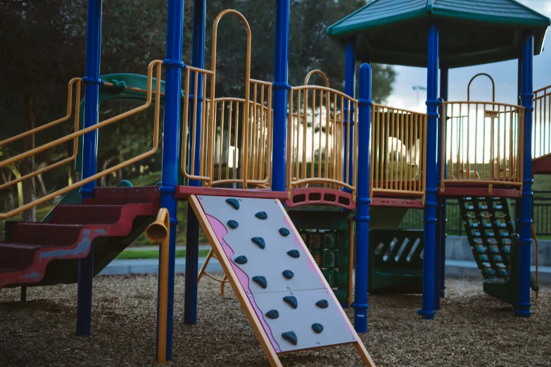 the playground features several slides and ladders