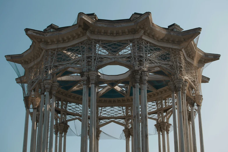 the tall clock tower has many ornate designs on it