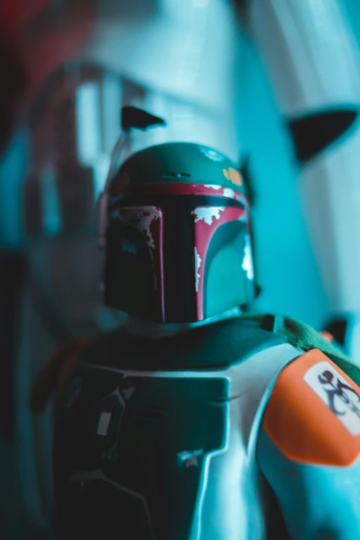 boba fett helmet on a star wars action figure