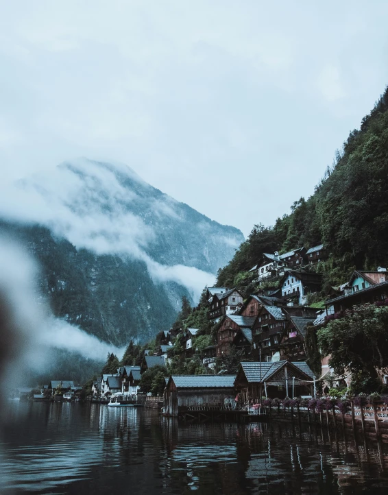 a large body of water sitting under clouds