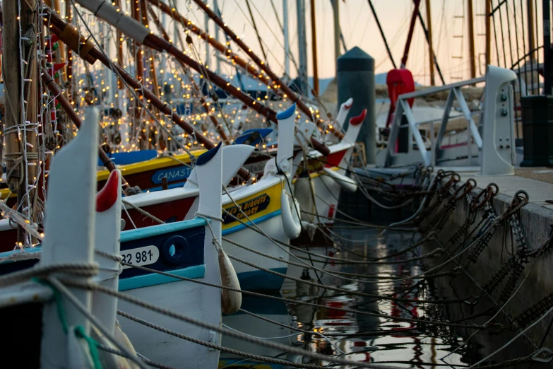 a row of boats sitting next to each other