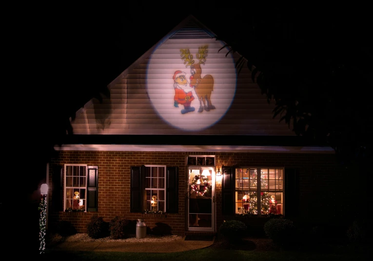 a house covered in christmas lights and decorations