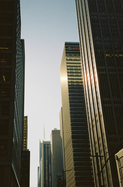 a row of tall buildings in a city