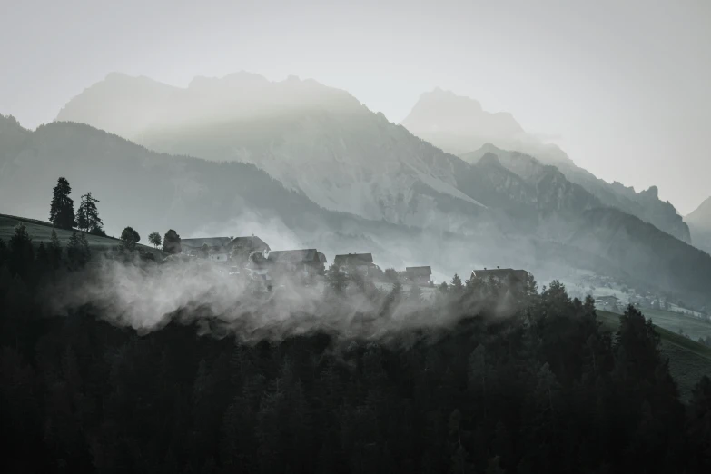 a black and white image of the hills below mountains