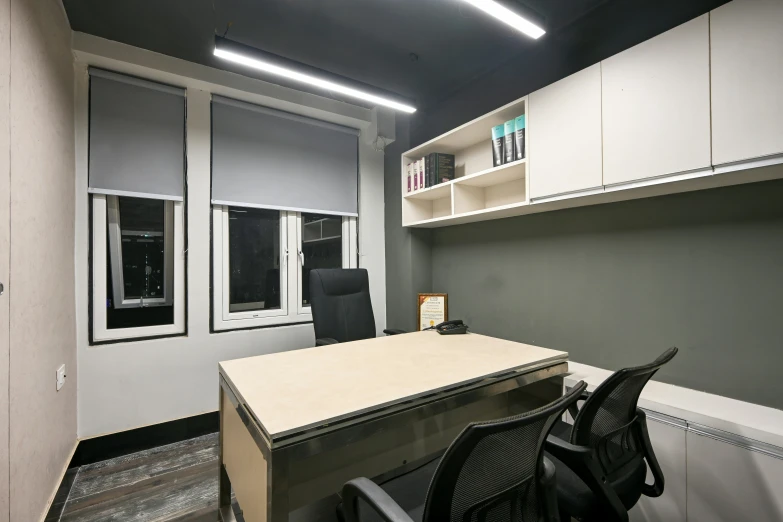 an office cubicle in an open - concept building