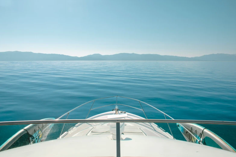 view from inside a sailboat on blue water