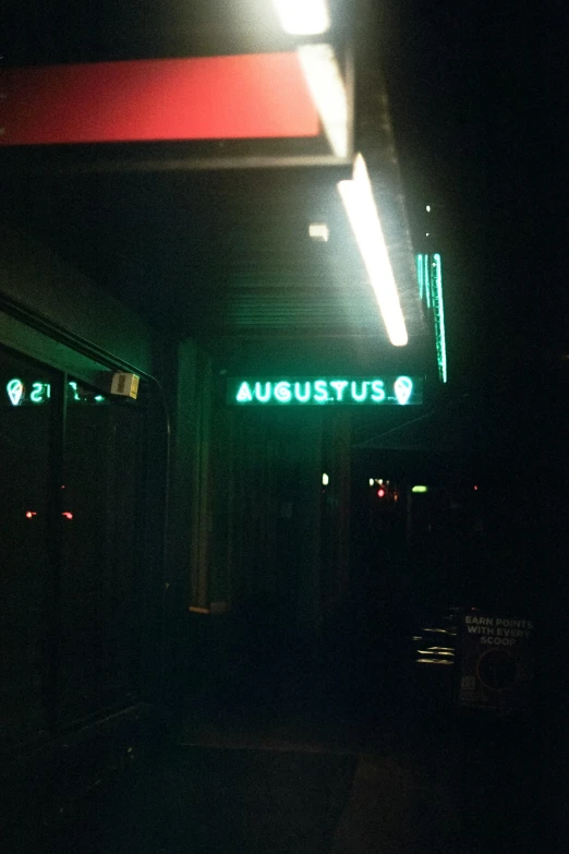 a motel is lit up by the evening light