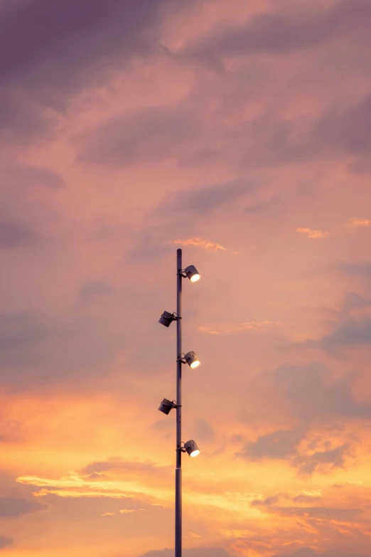 an image of four street lights in the distance