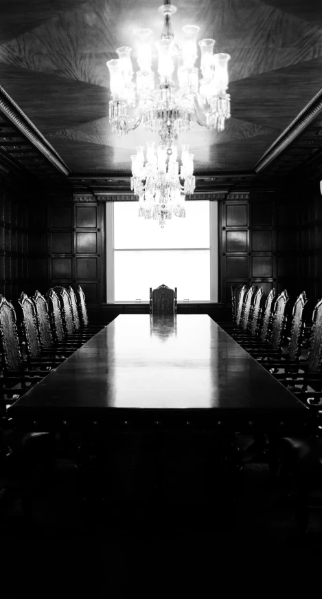 an empty conference room with a large table in it