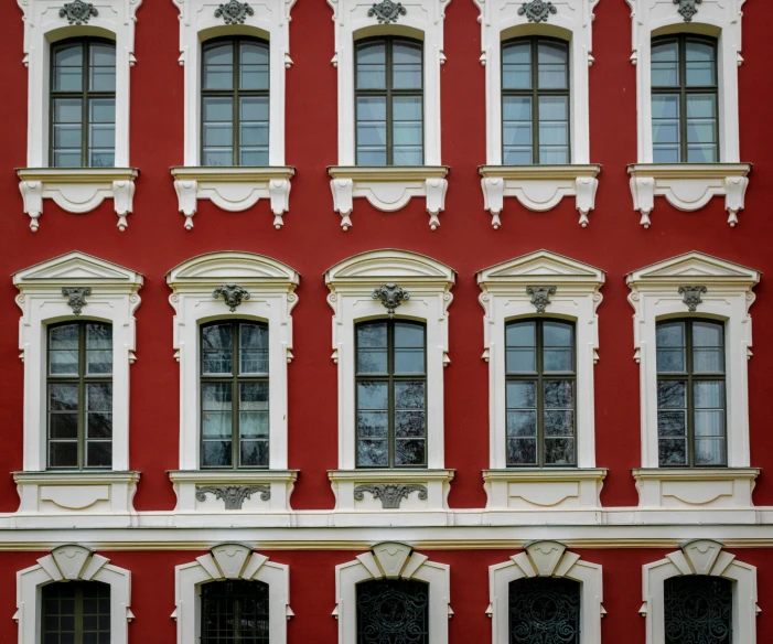 a large building with windows and a clock